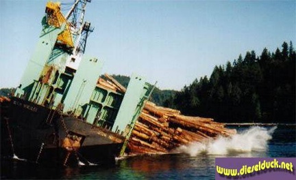 0028-log barge dumping