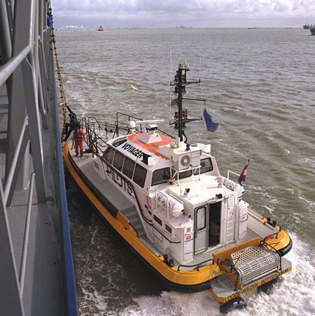 Voyager alongside with a pilot.jpg